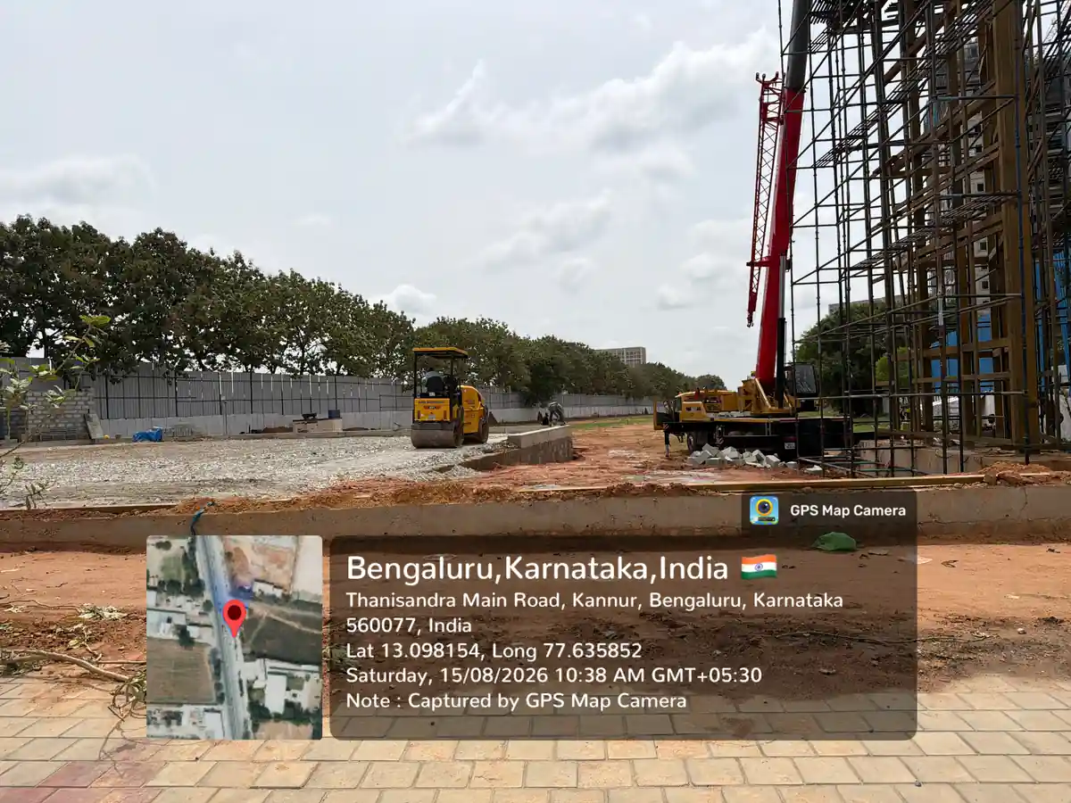Featured Image of Prestige Avon Construction Update August 2026 - gravel sub-base and road roller compacting the ground, GPS-stamped Thanisandra Main Road