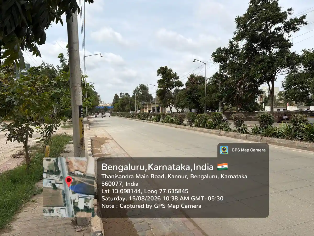 Featured Image of Thanisandra Main Road frontage and footpath outside Prestige Avon, North Bengaluru, GPS-stamped